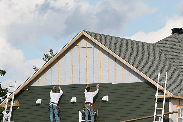 Professional Vinyl Siding technician working in Hawk Run, PA